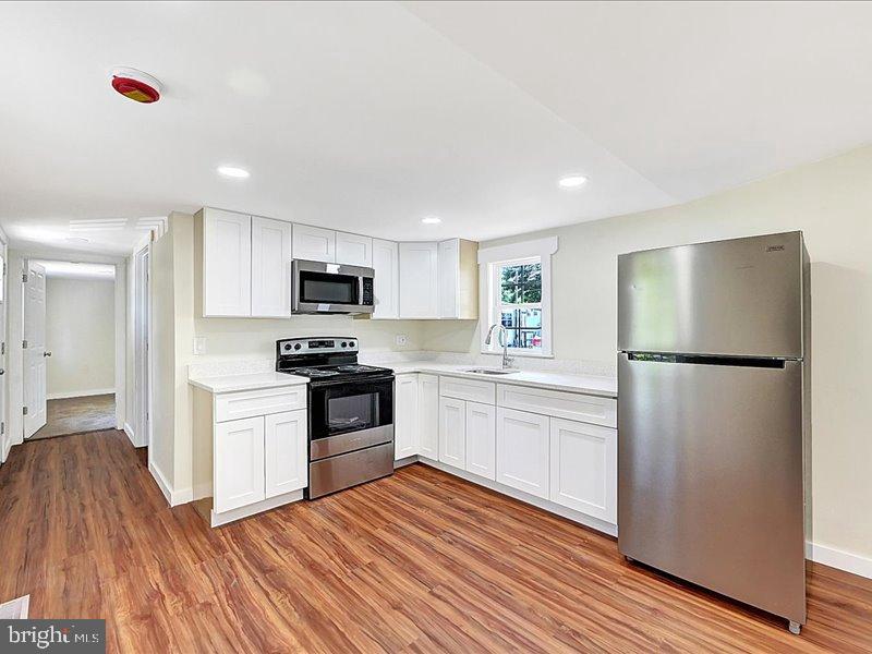 215 Freysville Road York, PA 17406 - Photo 2 of 17 Modern kitchen with sleek finishes.