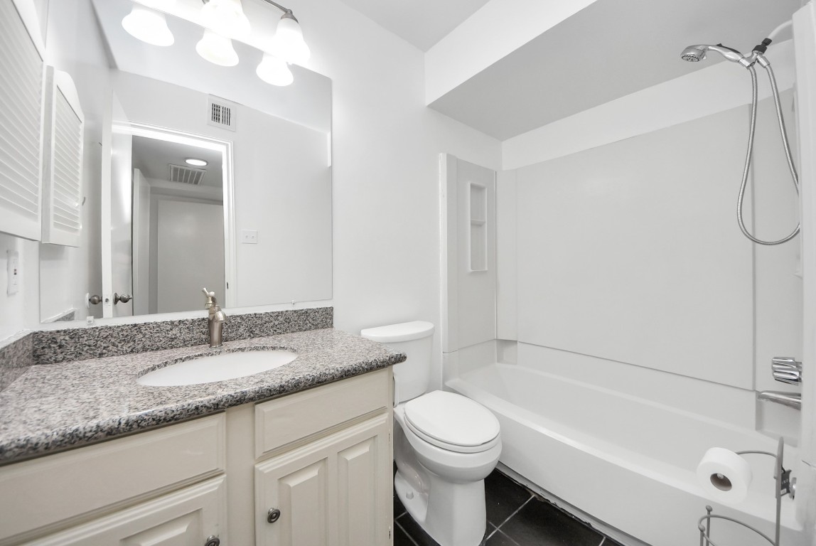 3500 Tangle Brush Drive, Unit 8 Spring, TX 77381 - Photo 23 of 32 Full bathroom offering a vanity and extra storage