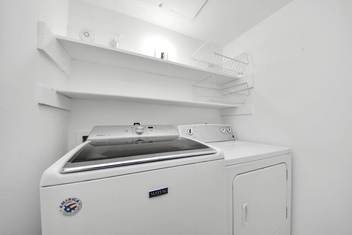 3500 Tangle Brush Drive, Unit 8 Spring, TX 77381 - Photo 25 of 32 Bright laundry area with built-in overhead shelving for convenient storage