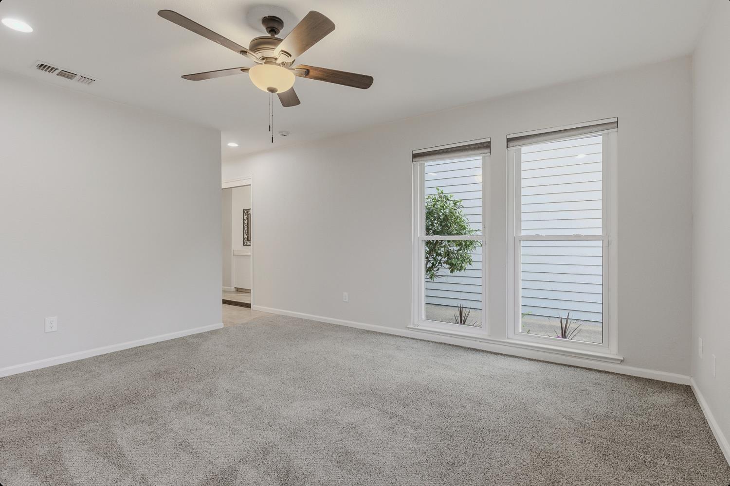 1175 Rose Tree Way Sacramento, CA 95831 - Photo 17 of 33 a view of an empty room with a window