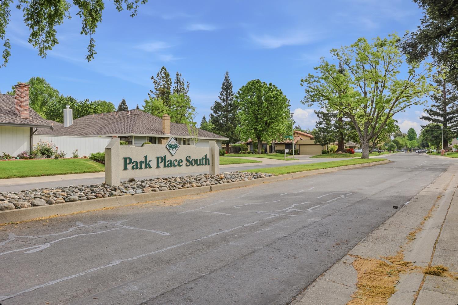 1175 Rose Tree Way Sacramento, CA 95831 - Photo 2 of 33 a view of a street with a bench and trees