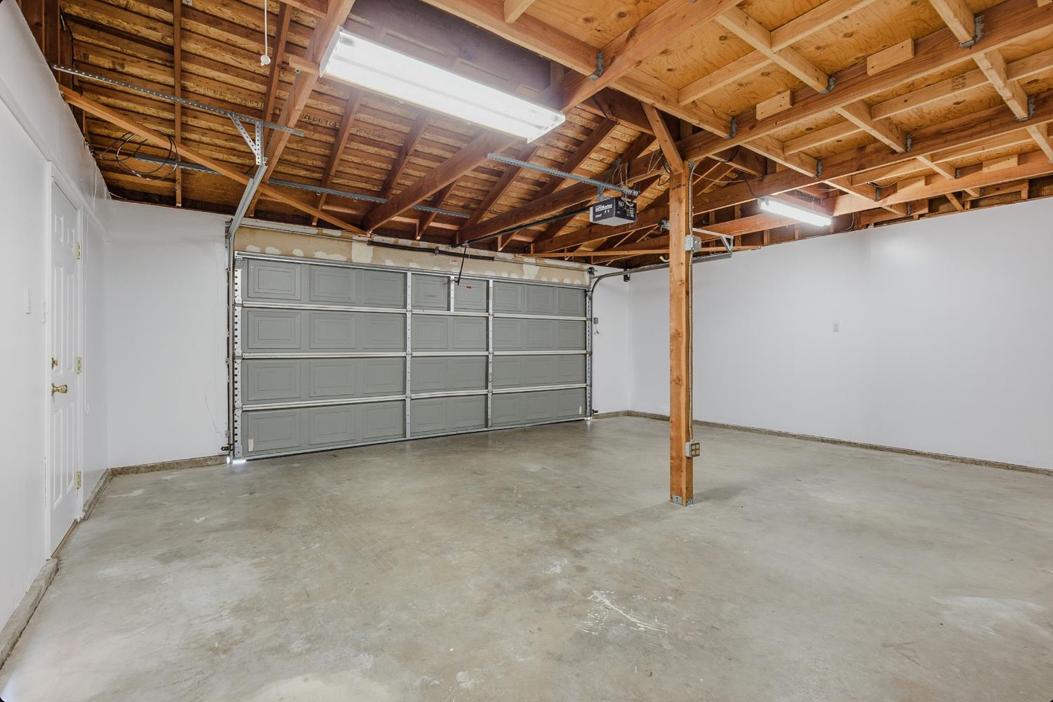 1175 Rose Tree Way Sacramento, CA 95831 - Photo 30 of 33 a view of room with garage