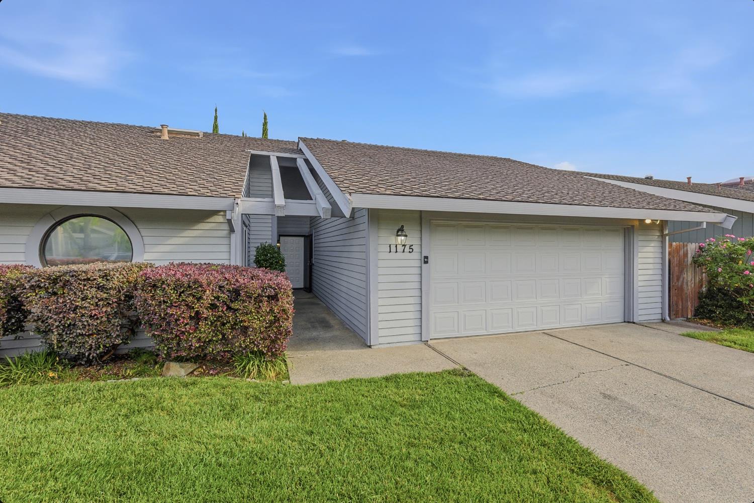 1175 Rose Tree Way Sacramento, CA 95831 - Photo 3 of 33 a front view of a house with garden