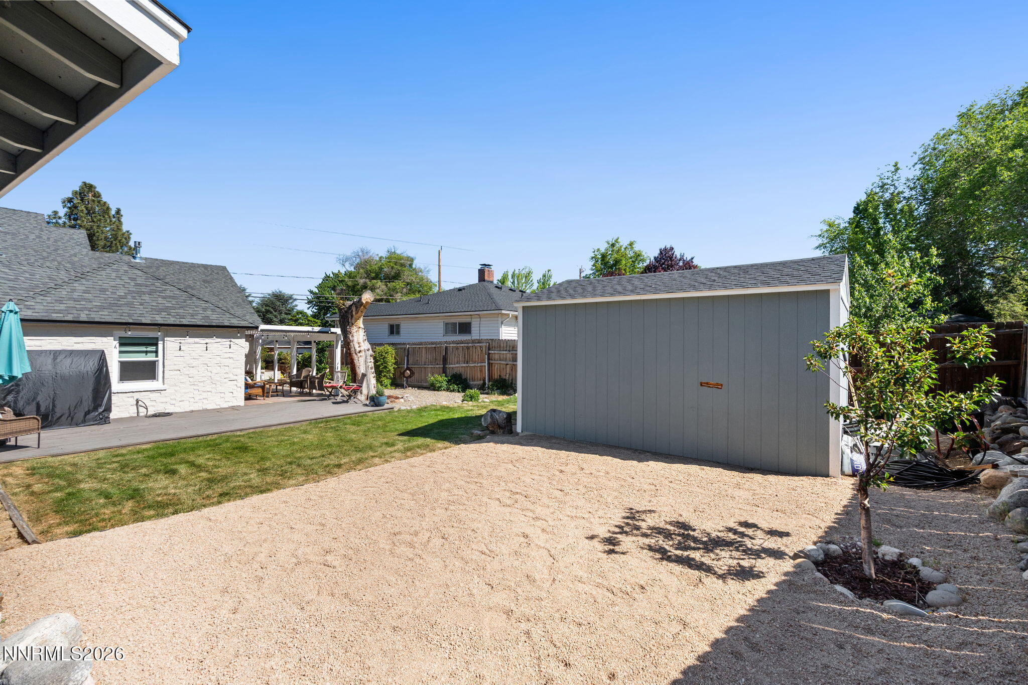 300 Country Club Drive Reno, NV 89509 - Photo 40 of 48 a front view of a house with a yard and garage