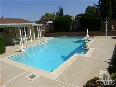 713 Appleton Road Simi Valley, CA 93065 - Photo 12 of 20 a swimming pool with outdoor seating and yard