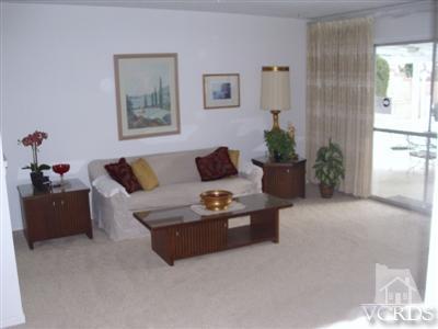 713 Appleton Road Simi Valley, CA 93065 - Photo 5 of 20 a living room with furniture and a potted plant
