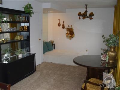 713 Appleton Road Simi Valley, CA 93065 - Photo 8 of 20 a room with table and potted plant