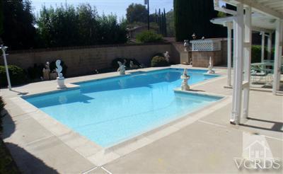 713 Appleton Road Simi Valley, CA 93065 - Photo 9 of 20 a view of a swimming pool with a patio