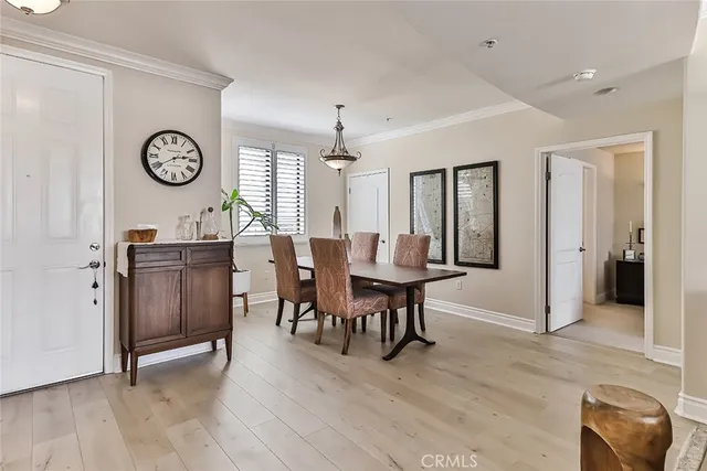 a view of a dining room with furniture and window