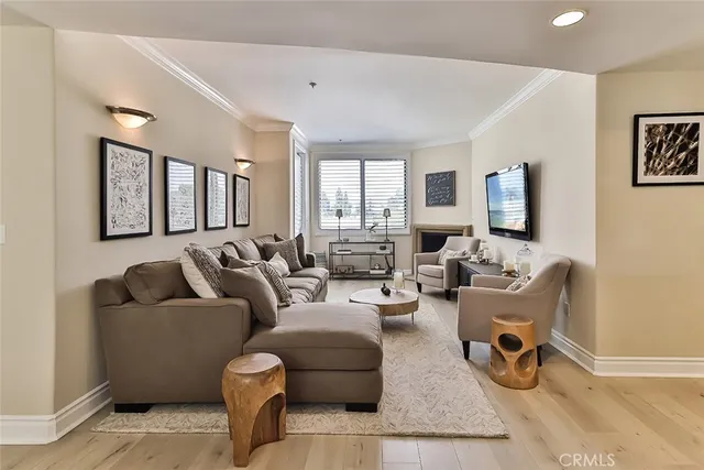 a living room with furniture or couch and a flat screen tv