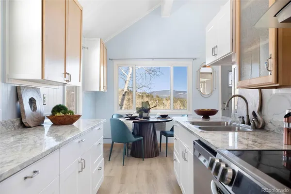 a kitchen with a sink and cabinets