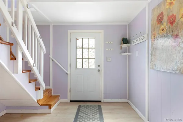 a view of an entryway with staircase