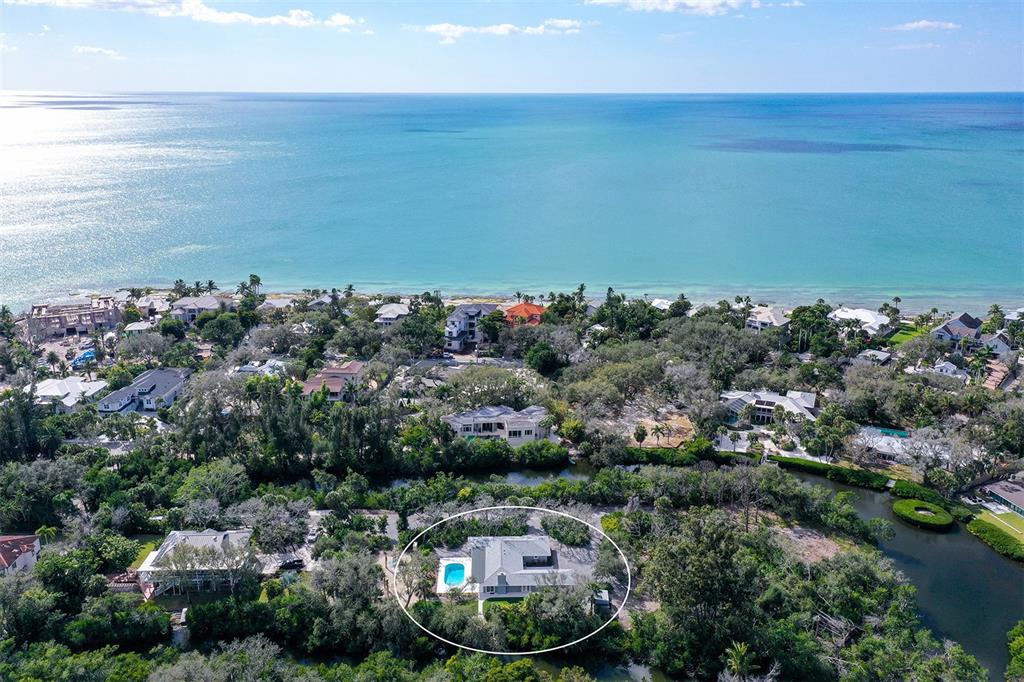 7221 Plovers Way Sarasota, FL 34242 - Photo 5 of 100 an aerial view of a house with a yard