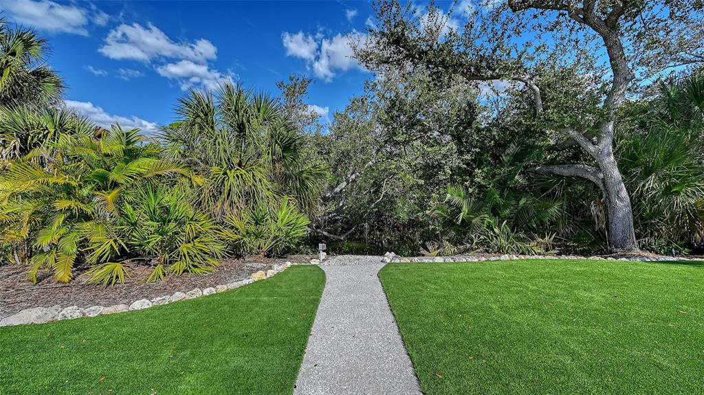 7221 Plovers Way Sarasota, FL 34242 - Photo 59 of 100 a view of park with large trees