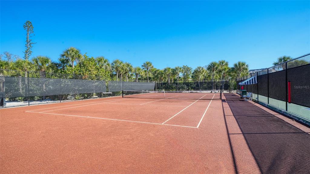 7221 Plovers Way Sarasota, FL 34242 - Photo 99 of 100 a view of a tennis court
