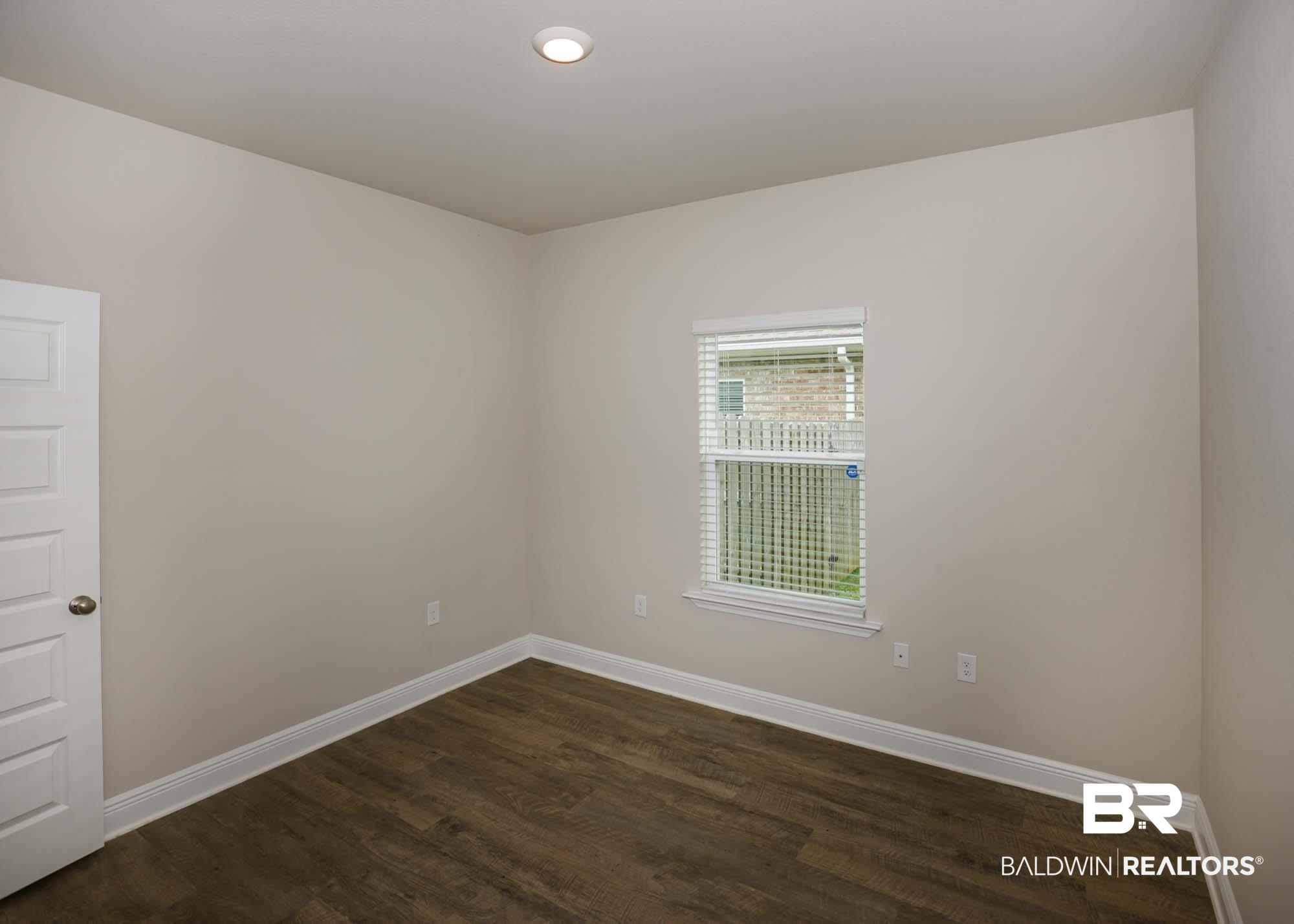 1436 Kairos Loop Foley, AL 36535 - Photo 30 of 52 Spare room with dark wood-type flooring and recessed lighting