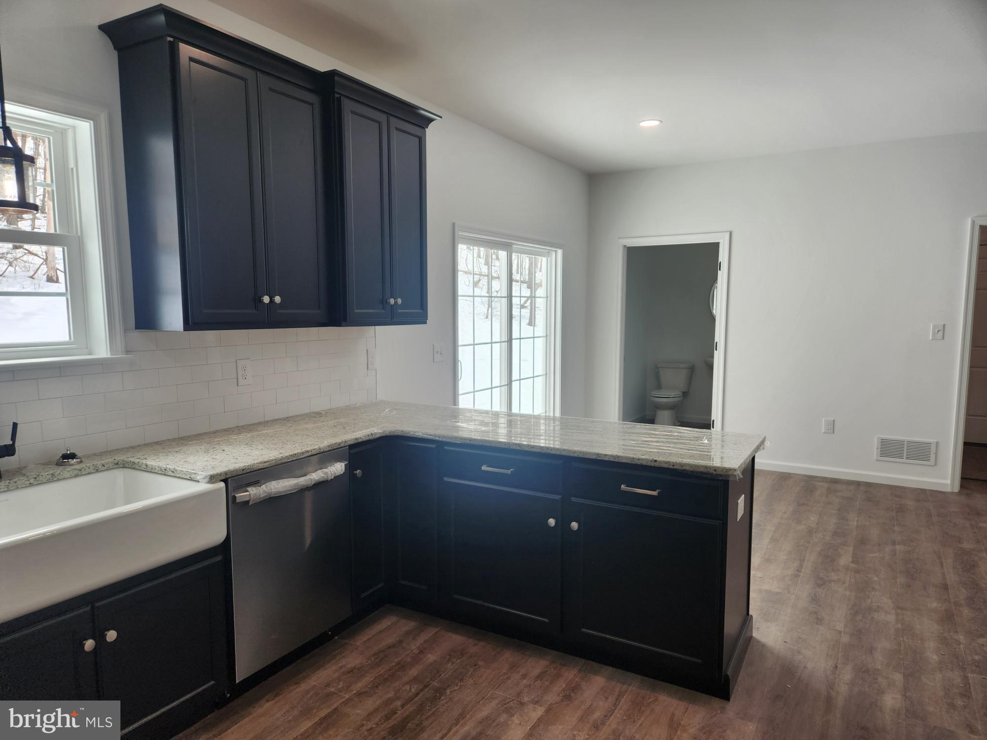 1929 Dunkleberger Road Elliottsburg, PA 17024 - Photo 8 of 48 Modern kitchen with sleek black cabinetry.