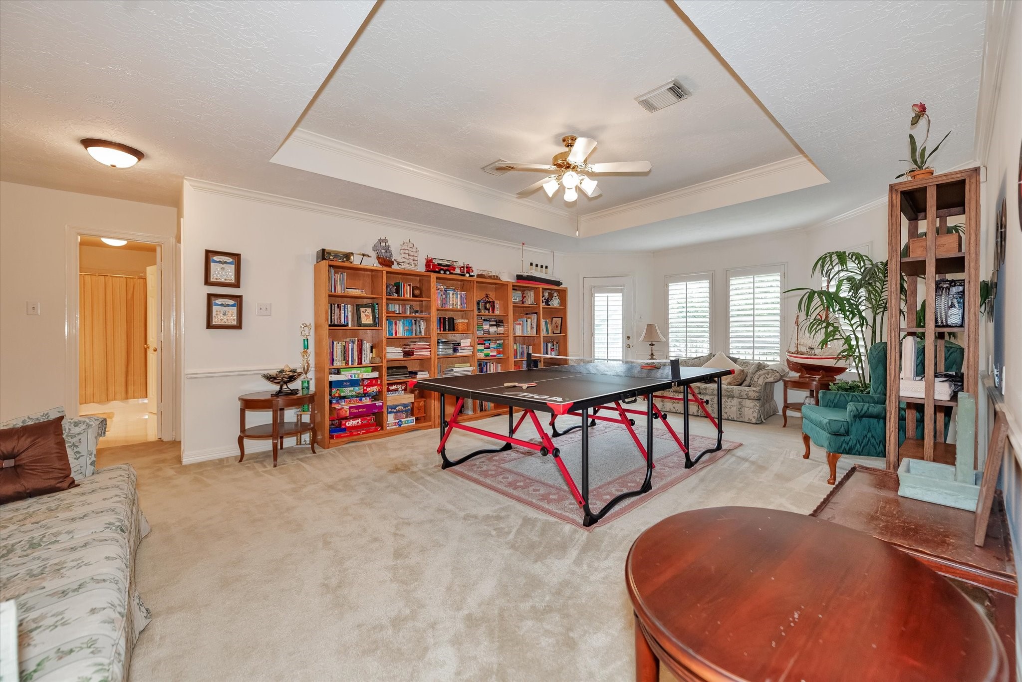5718 Oakmoss Trail Spring, TX 77379 - Photo 27 of 48 a living room with furniture and a couch