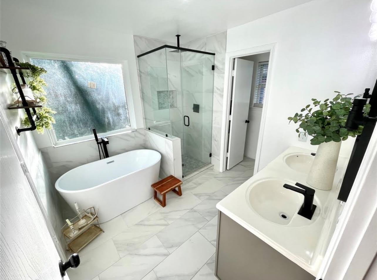 1811 Tickner Street Conroe, TX 77301 - Photo 12 of 20 a bathroom with a sink mirror toilet and shower