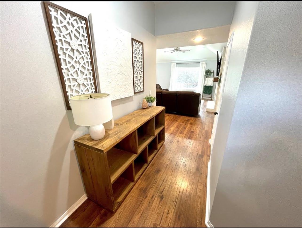 1811 Tickner Street Conroe, TX 77301 - Photo 2 of 20 a living room with furniture and a window