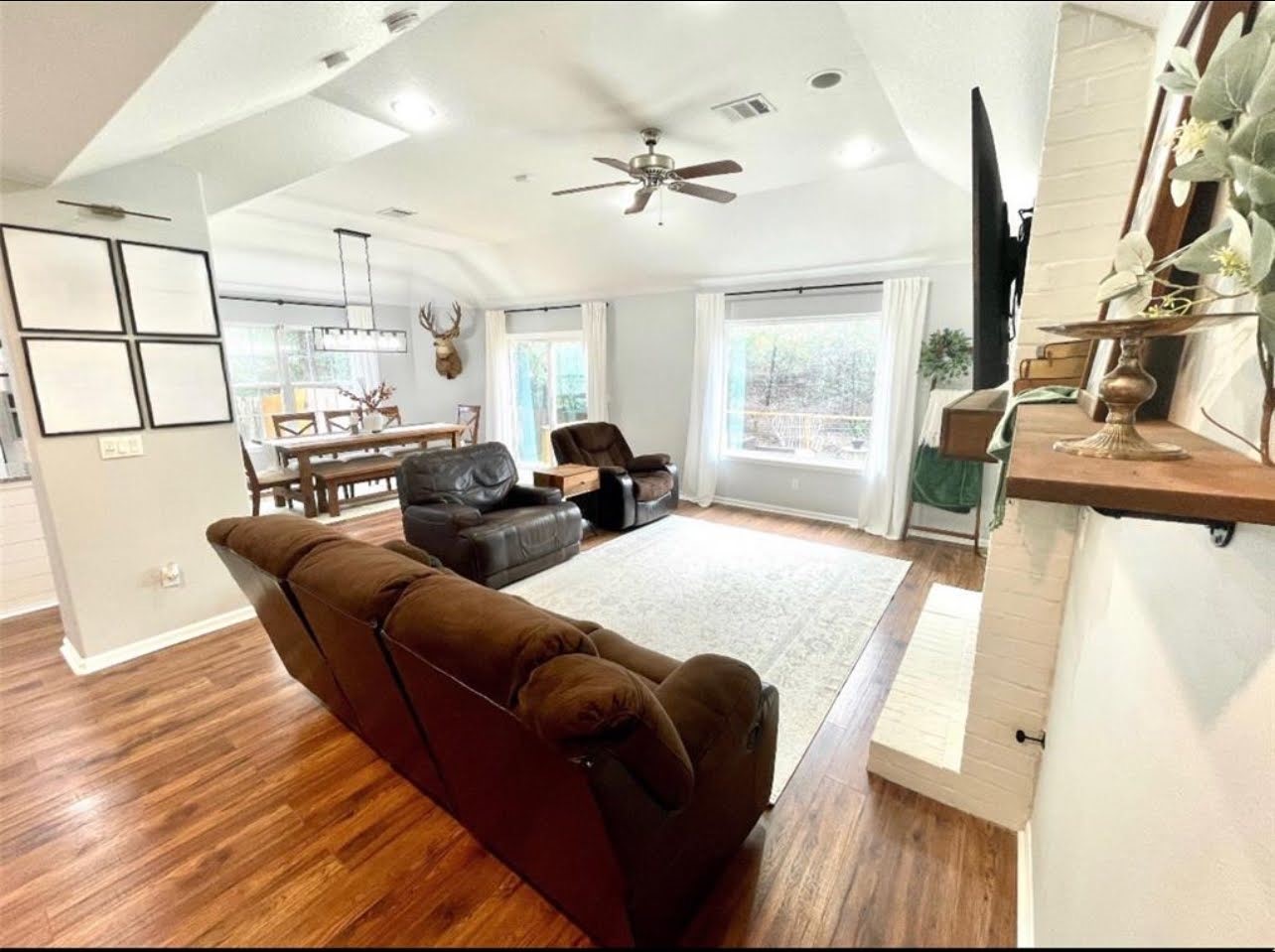 1811 Tickner Street Conroe, TX 77301 - Photo 4 of 20 a living room with furniture and a large window
