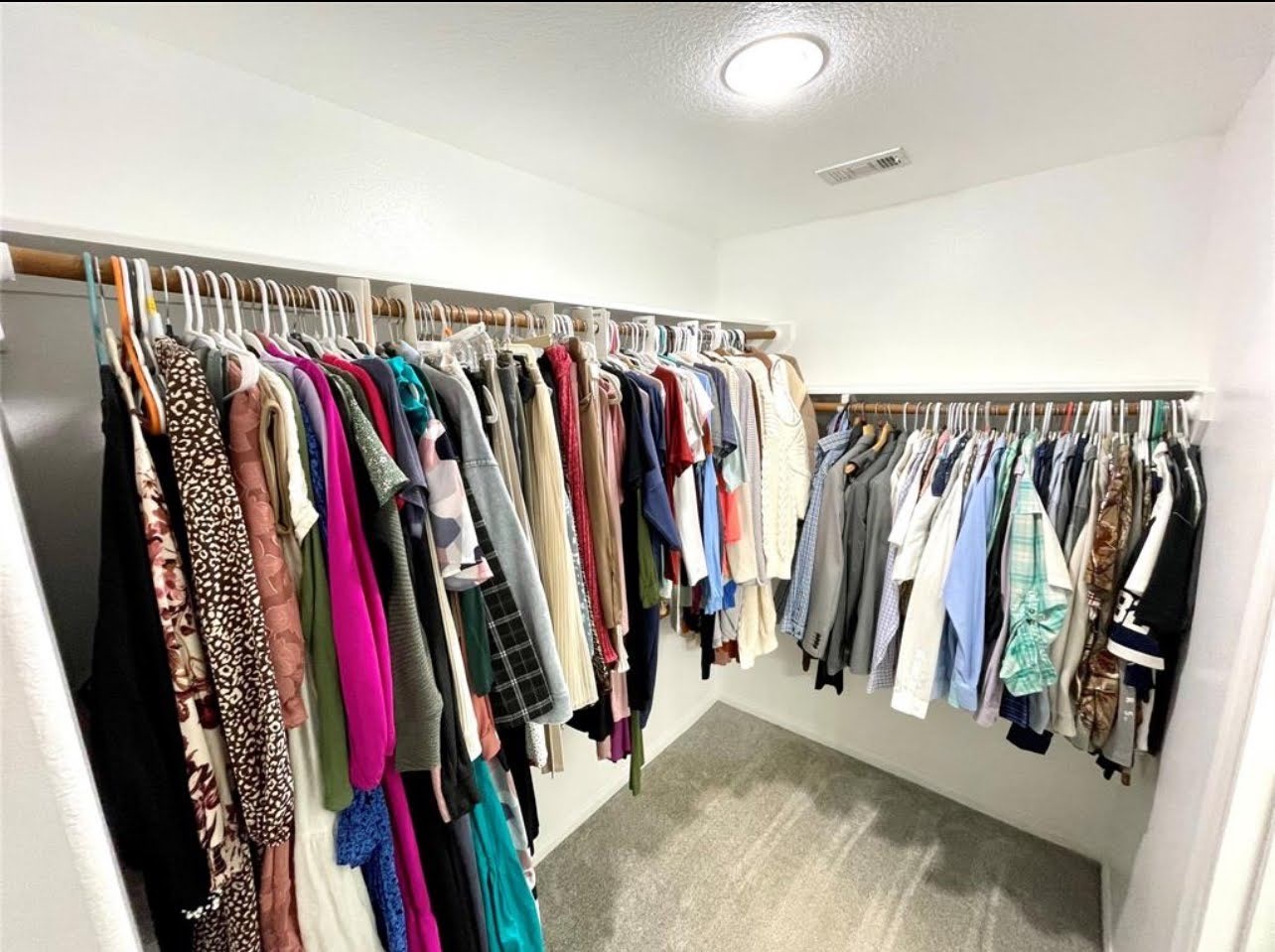 1811 Tickner Street Conroe, TX 77301 - Photo 10 of 20 a view of walk in closet with clothes