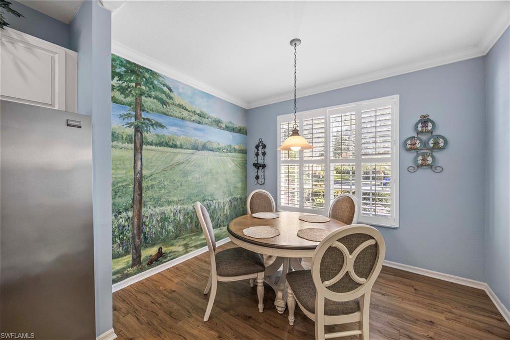 3589 Periwinkle Way Naples, FL 34114 - Photo 11 of 39 a dining room with furniture window and outside view