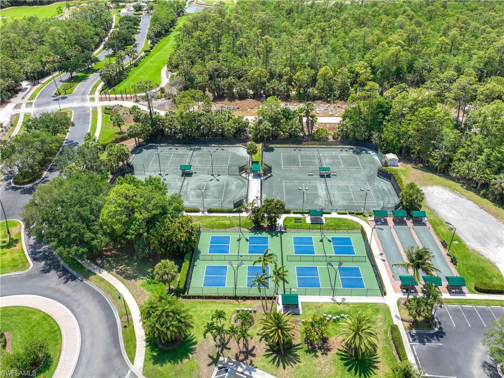 3589 Periwinkle Way Naples, FL 34114 - Photo 33 of 39 an aerial view of a house with outdoor space pool seating area and yard