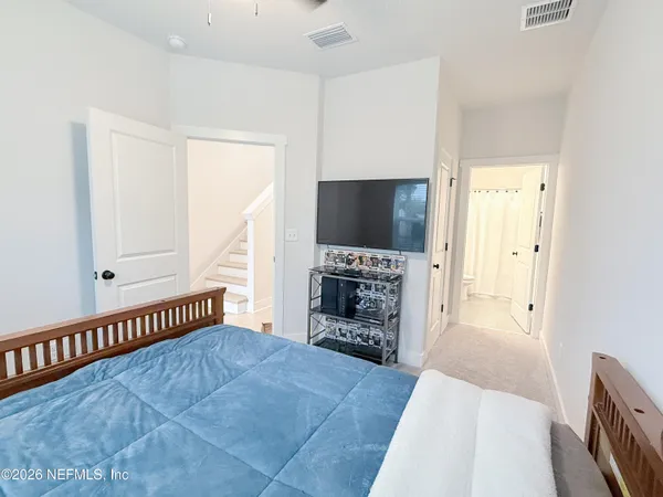 a view of a livingroom with a flat screen tv