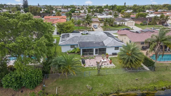 an aerial view of a house with a outdoor space