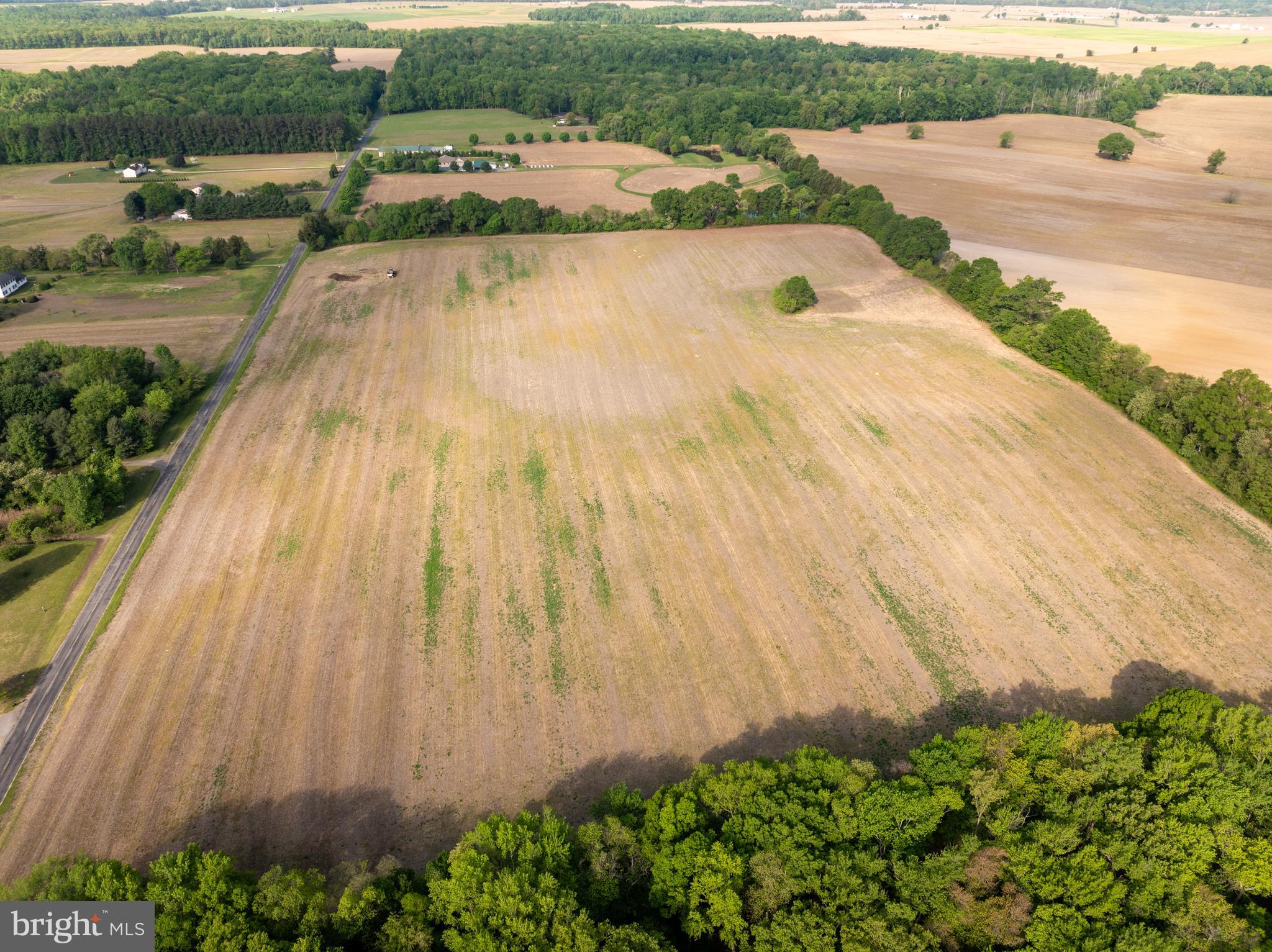 Baxter Road Sudlersville, MD 21668 - Photo 12 of 13 a view of a swimming pool with a yard