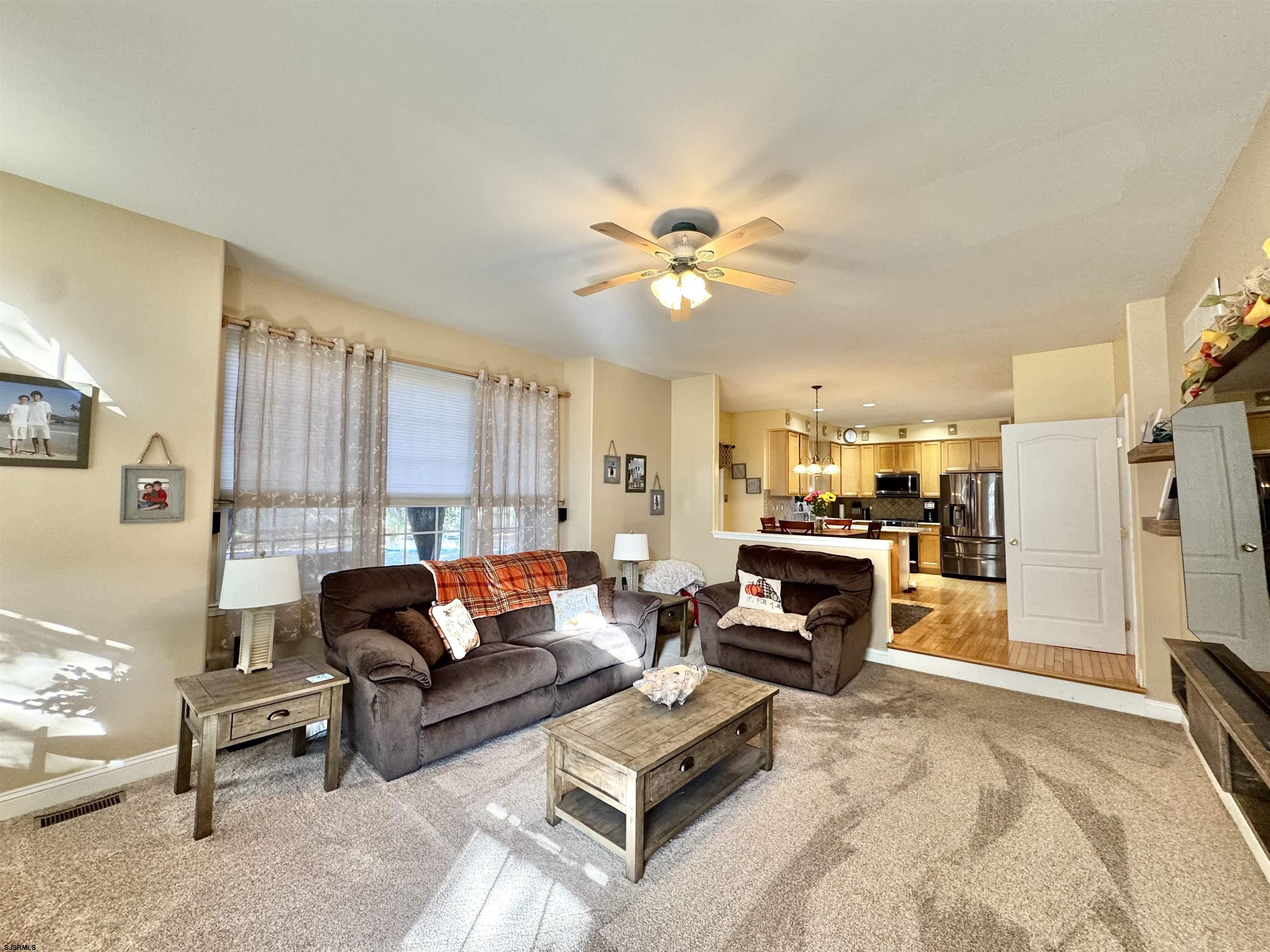 215 Prancer Road Egg Harbor Township, NJ 08234 - Photo 14 of 46 a living room with furniture and a fireplace