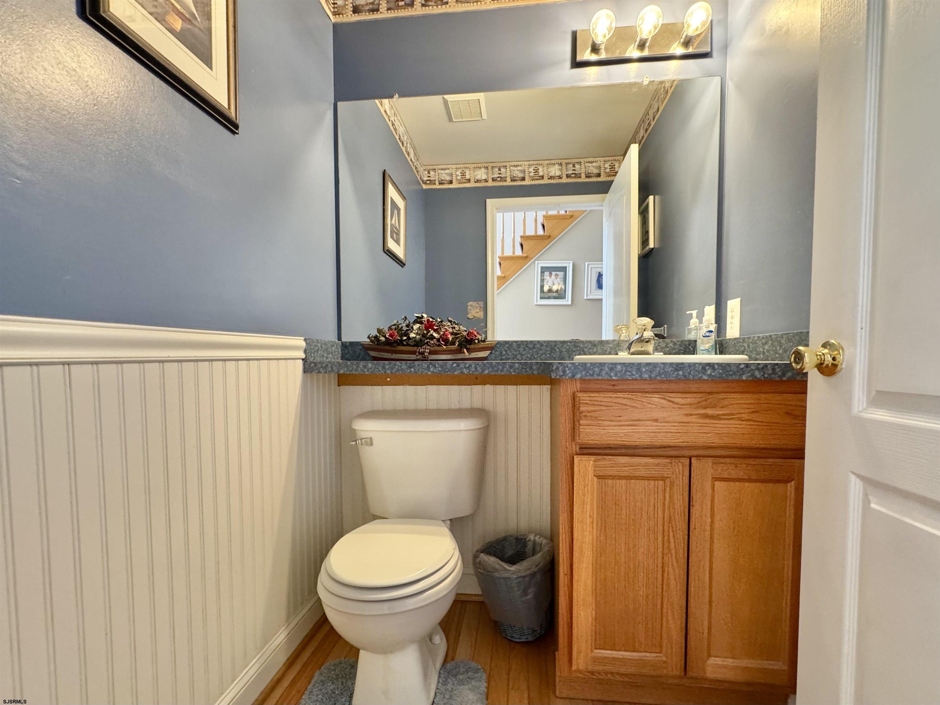 215 Prancer Road Egg Harbor Township, NJ 08234 - Photo 16 of 46 a bathroom with a granite countertop toilet and a sink