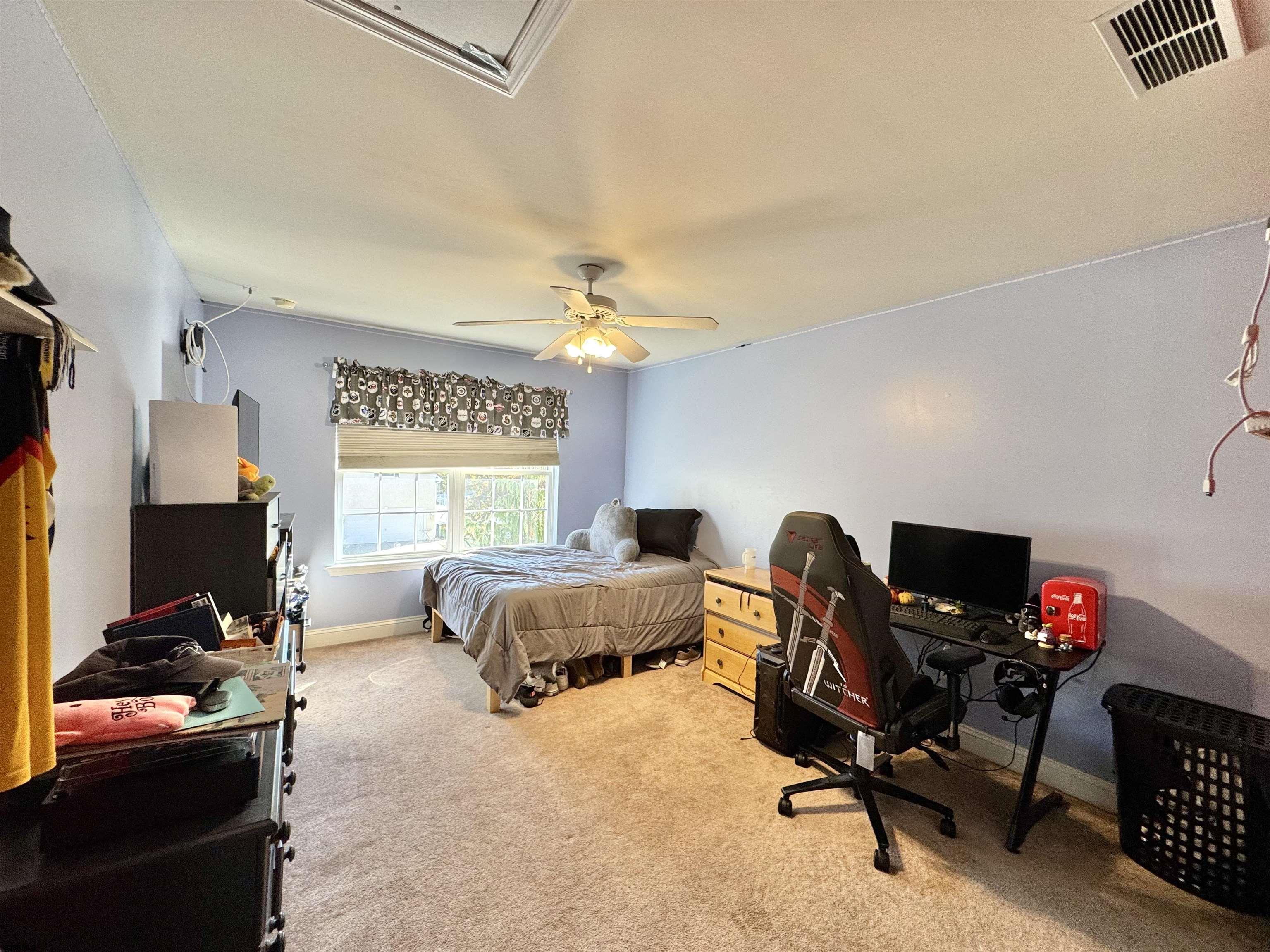 215 Prancer Road Egg Harbor Township, NJ 08234 - Photo 24 of 46 a bedroom with furniture and a window