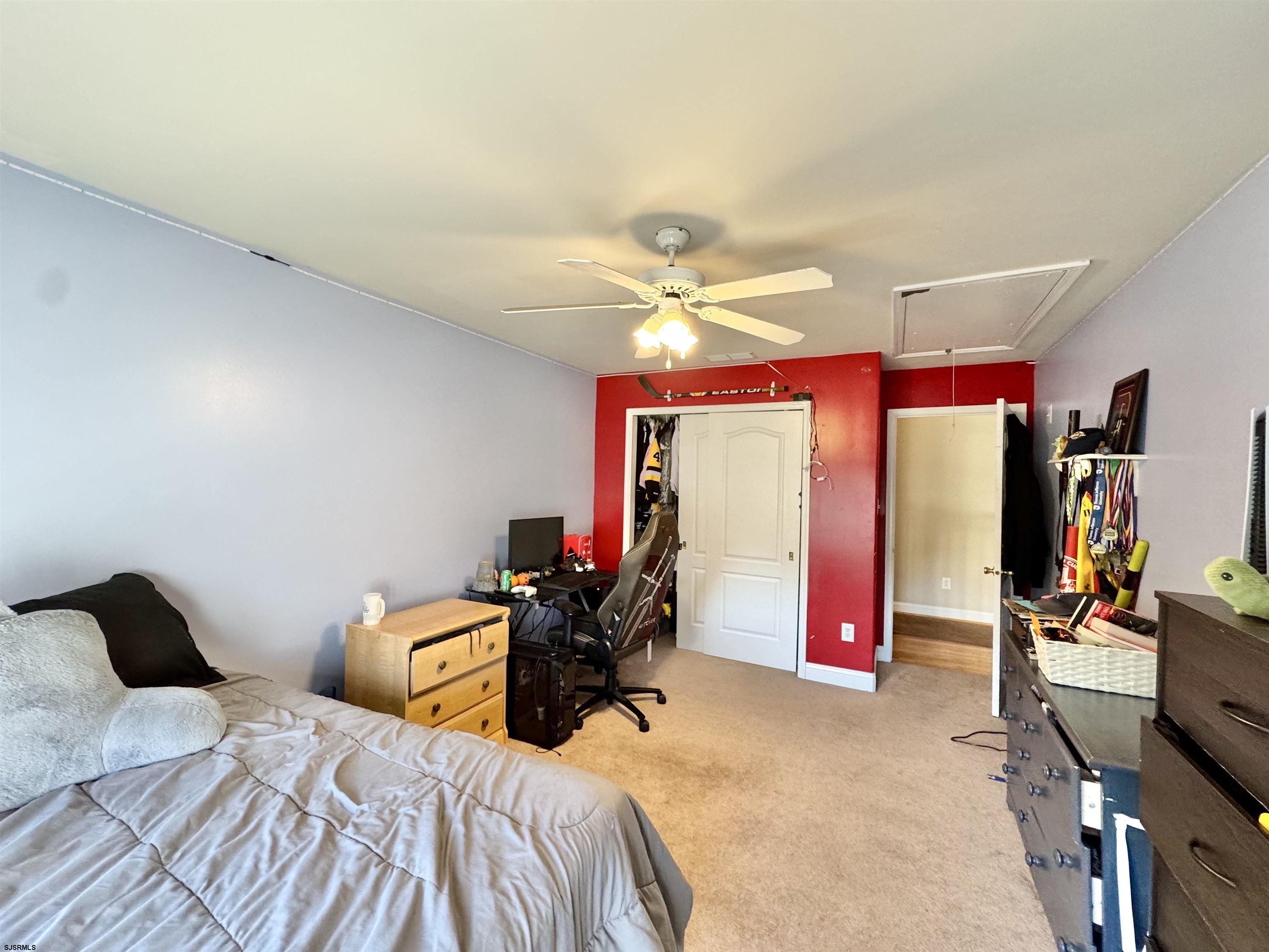 215 Prancer Road Egg Harbor Township, NJ 08234 - Photo 25 of 46 a bedroom with bed and window