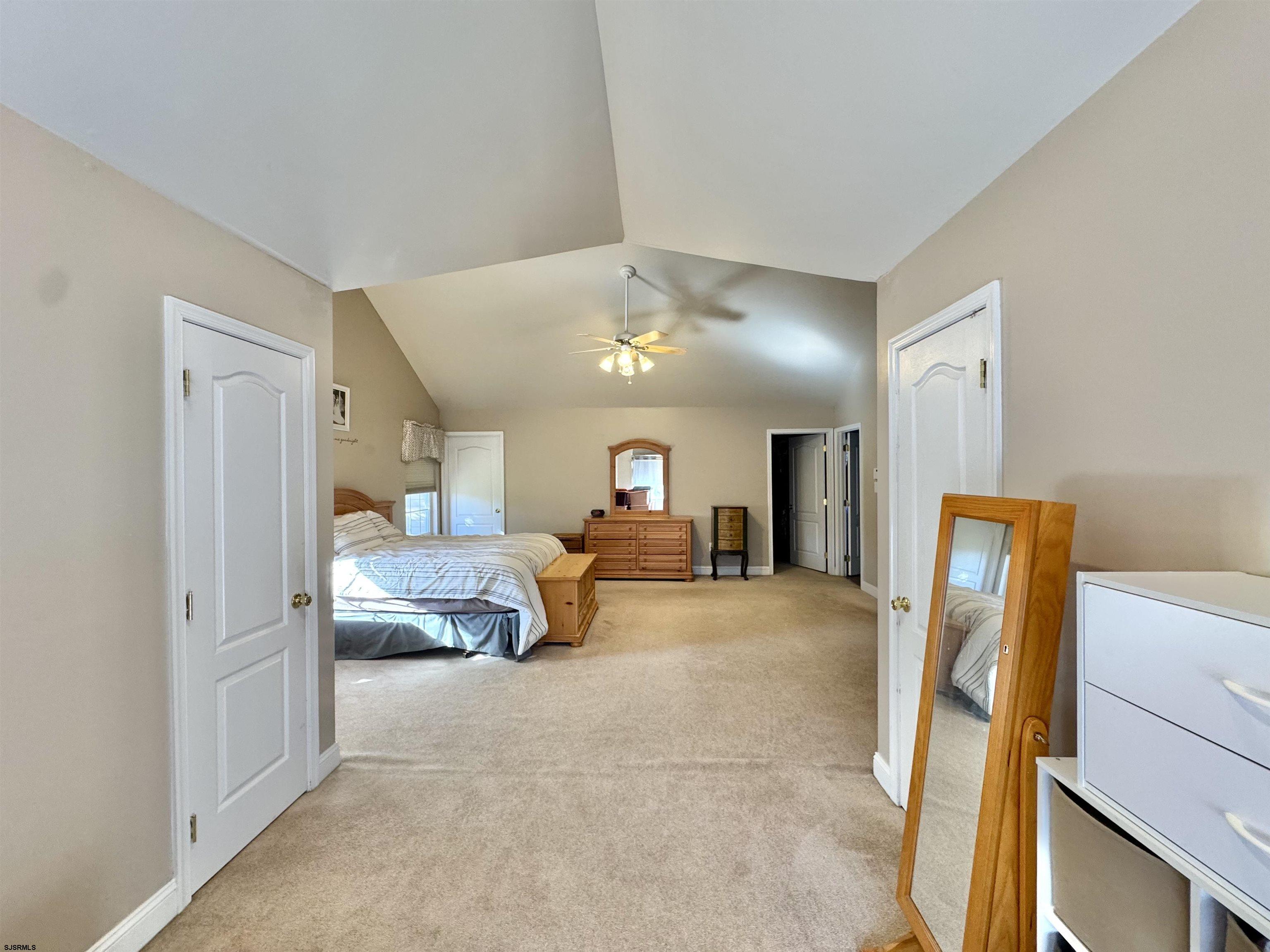 215 Prancer Road Egg Harbor Township, NJ 08234 - Photo 28 of 46 a living room with furniture and a flat screen tv