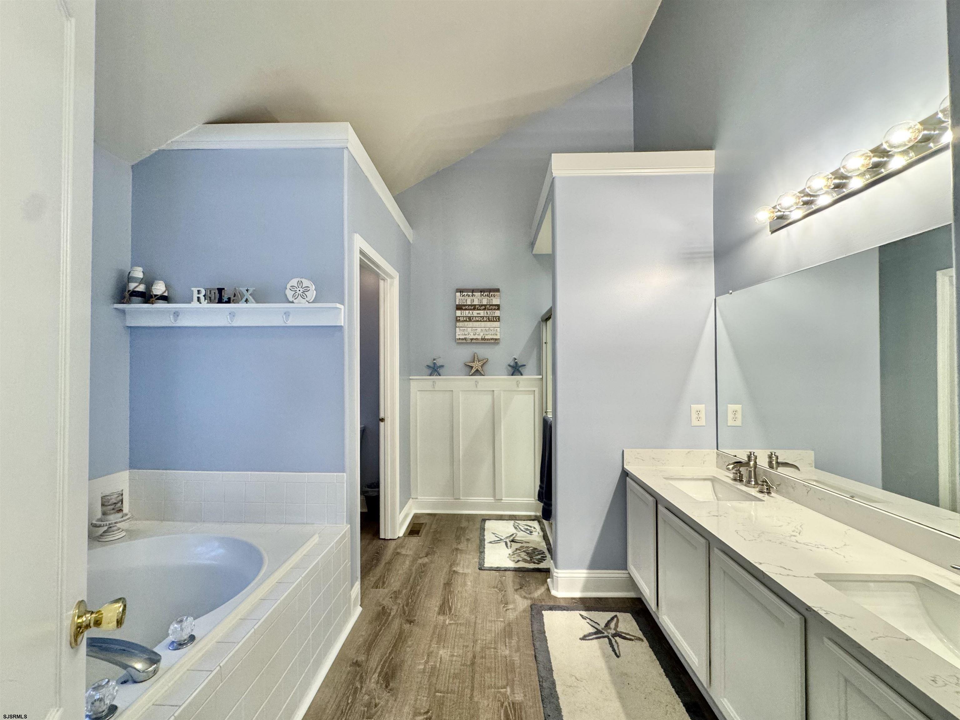 215 Prancer Road Egg Harbor Township, NJ 08234 - Photo 29 of 46 a bathroom with a tub sink and mirror