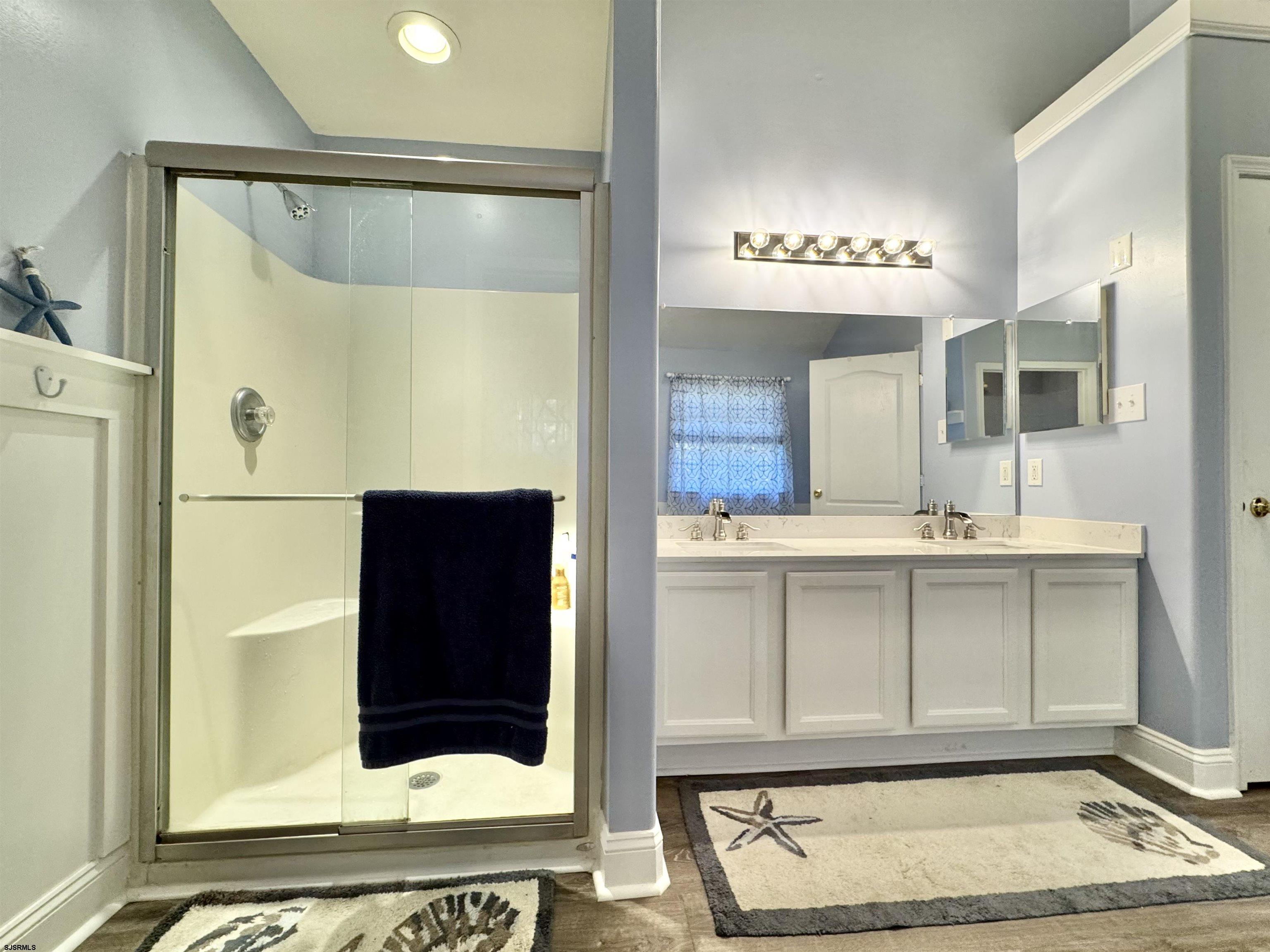 215 Prancer Road Egg Harbor Township, NJ 08234 - Photo 30 of 46 a bathroom with a sink and a mirror