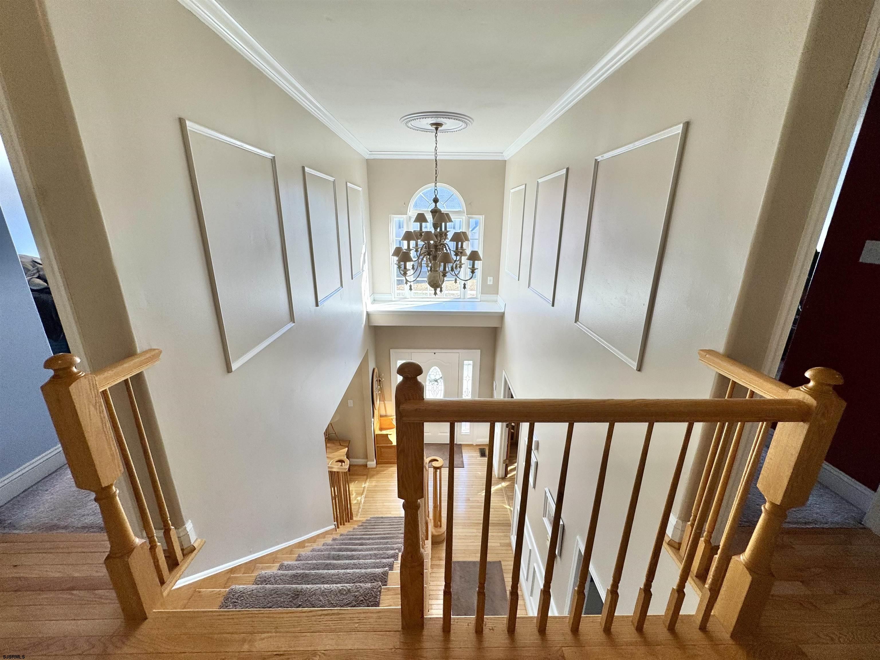 215 Prancer Road Egg Harbor Township, NJ 08234 - Photo 33 of 46 a view of a hallway view with wooden floor and staircase