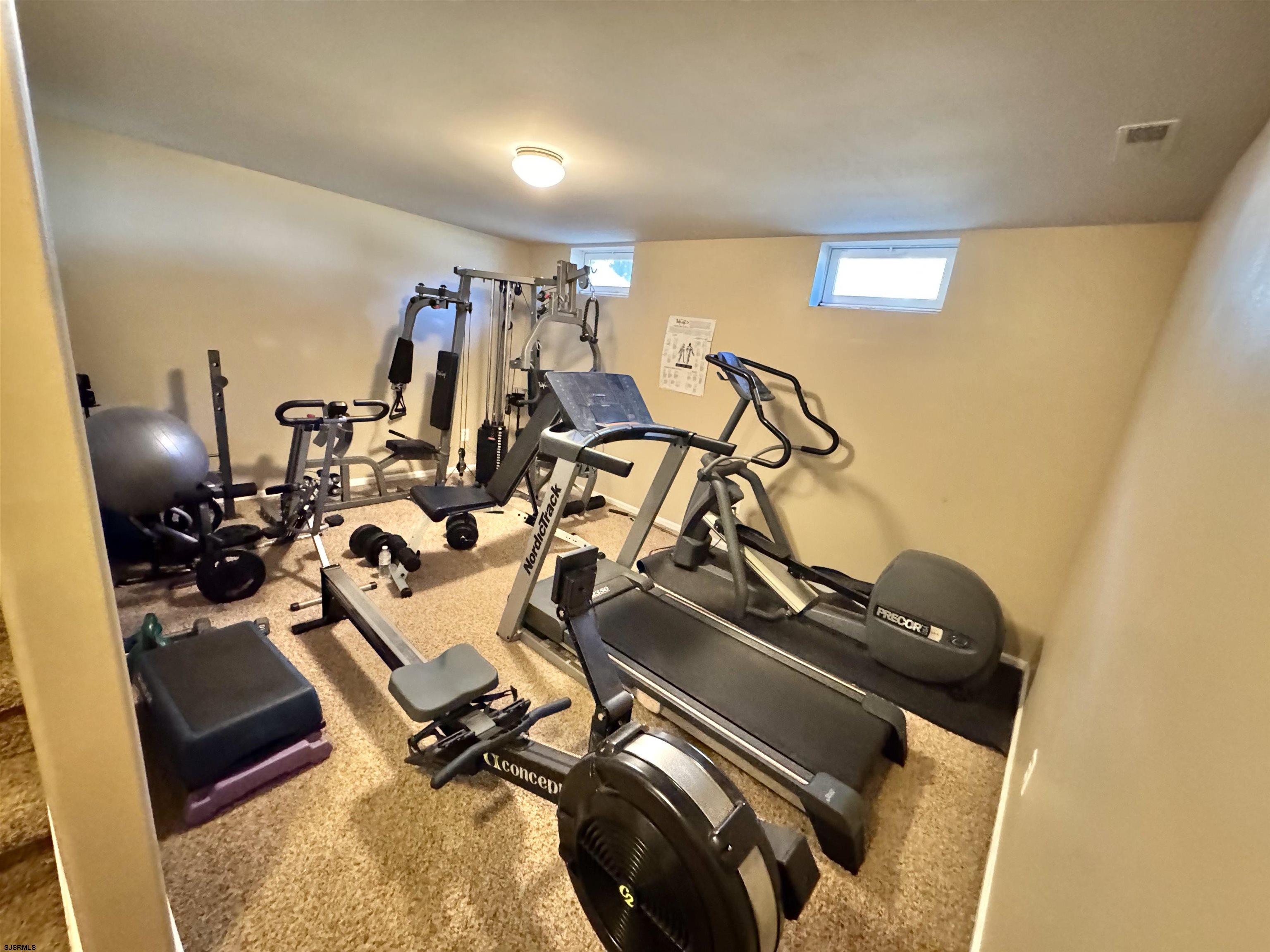 215 Prancer Road Egg Harbor Township, NJ 08234 - Photo 35 of 46 a view of a room with gym equipment