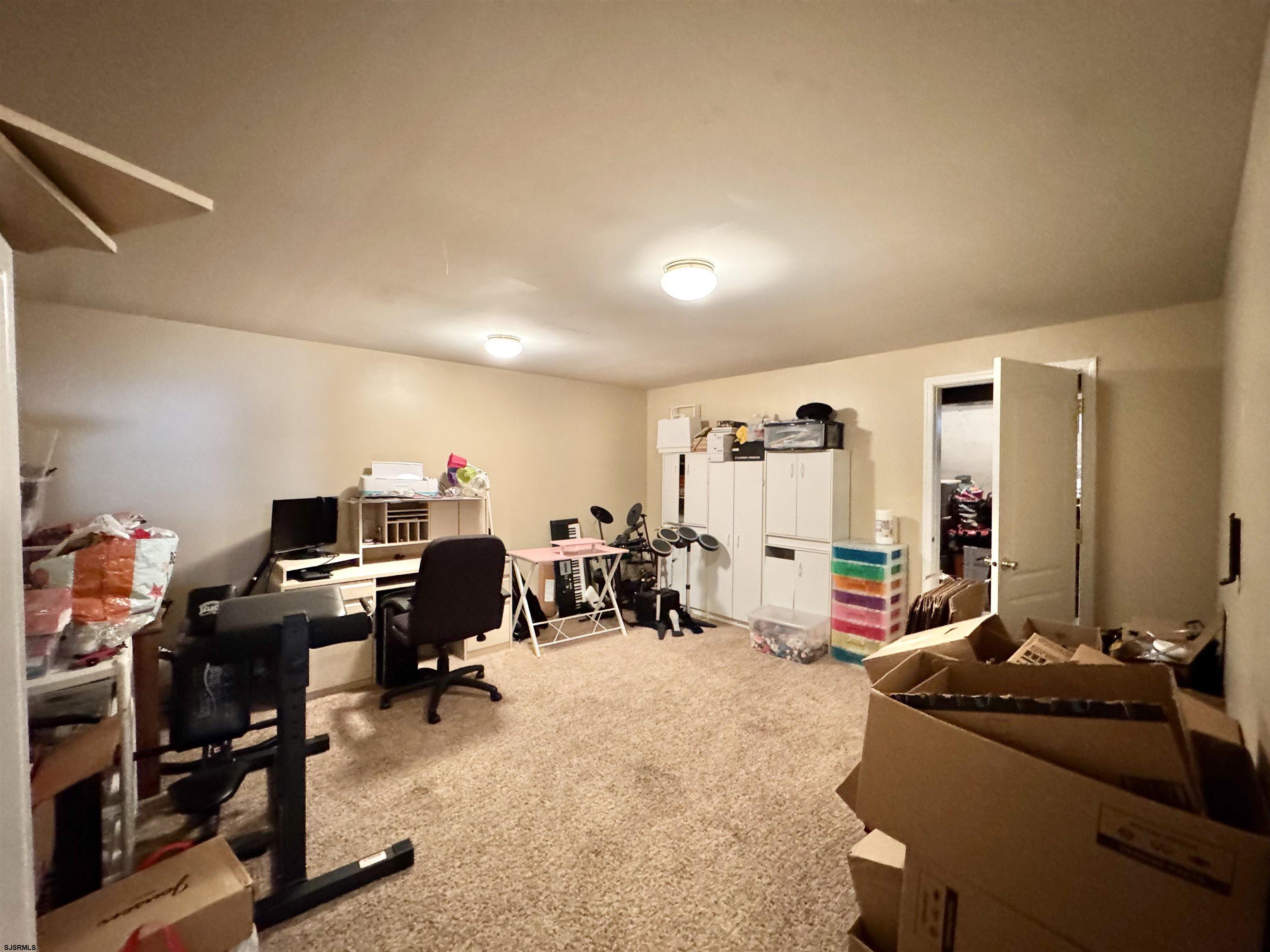 215 Prancer Road Egg Harbor Township, NJ 08234 - Photo 36 of 46 a view of a room with gym equipment