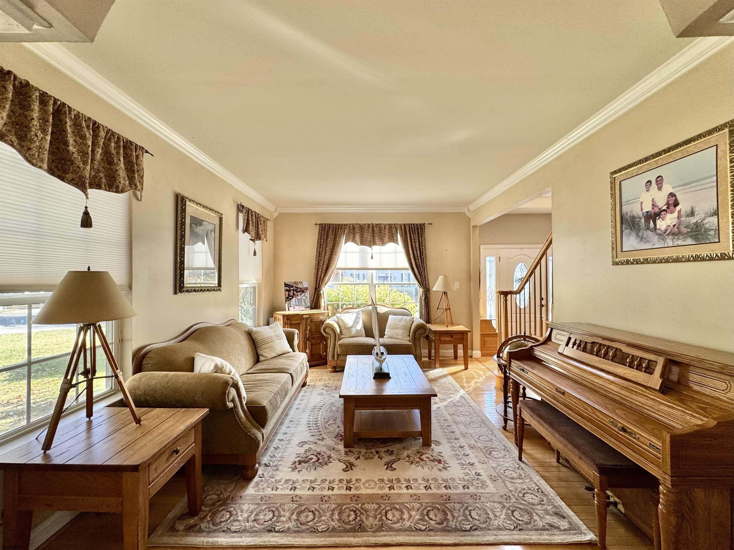 215 Prancer Road Egg Harbor Township, NJ 08234 - Photo 5 of 46 a living room with furniture and a window