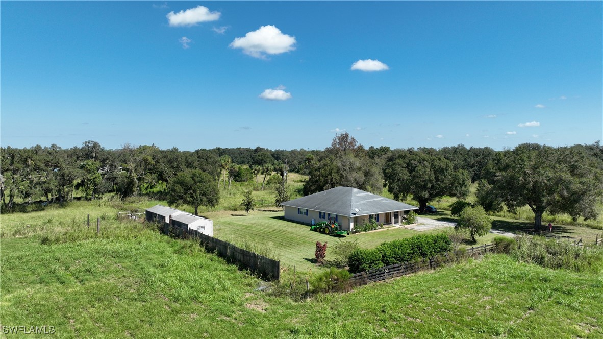 2751 Styles Road Alva, FL 33920 - Photo 7 of 31 a view of a house with a yard and outdoor space