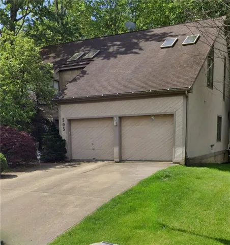 a front view of a house with balcony