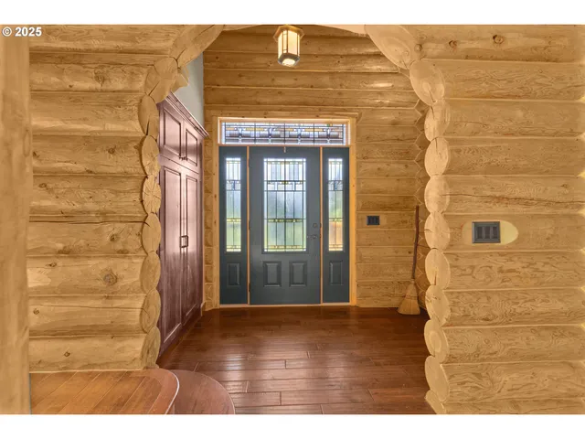 a view of outdoor space and wooden floor