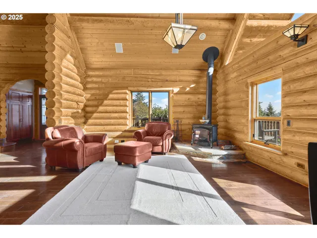 a outdoor space with patio furniture and a fireplace