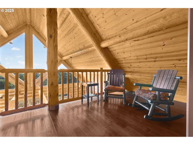 a view of a chairs and table in the patio