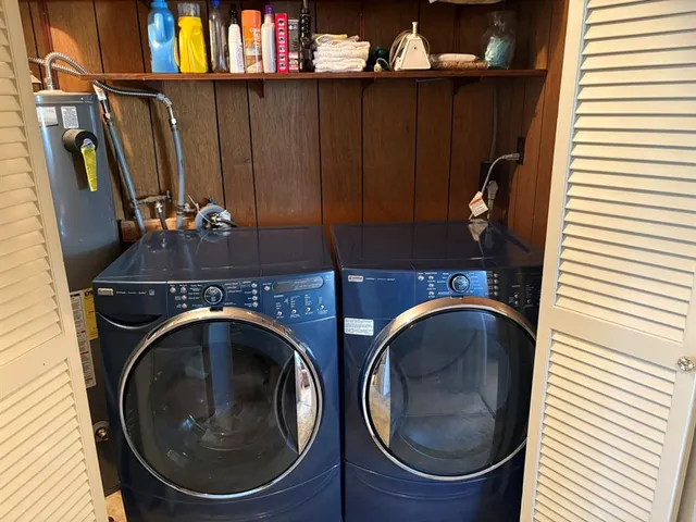 a utility room with dryer and washer