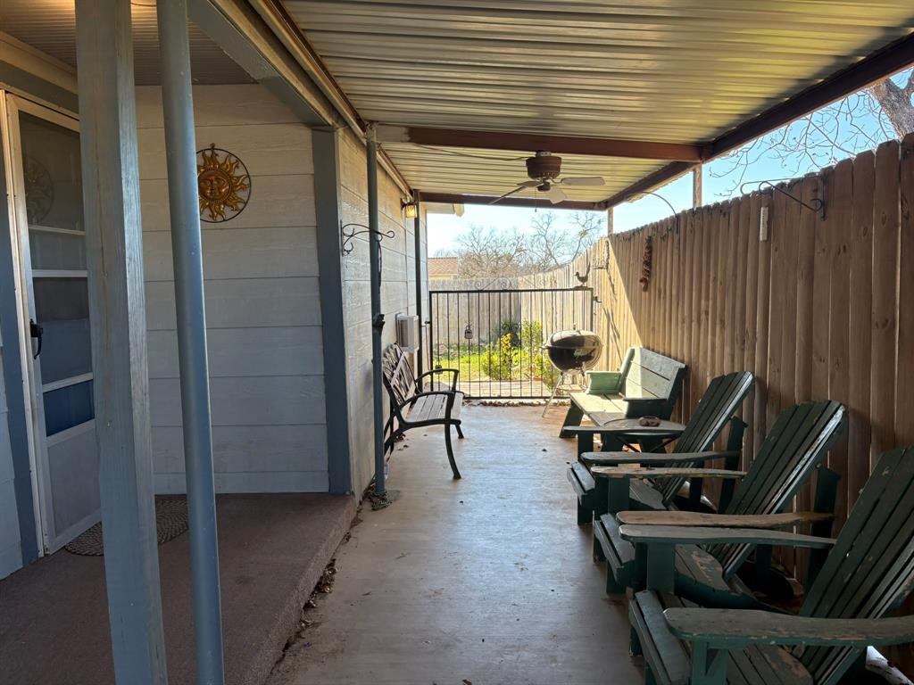 409 East Truett Street Winters, TX 79567 - Photo 17 of 21 Covered patio for shaded entertaining is located right off of the kitchen!