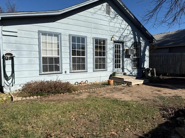 a house view with a outdoor space
